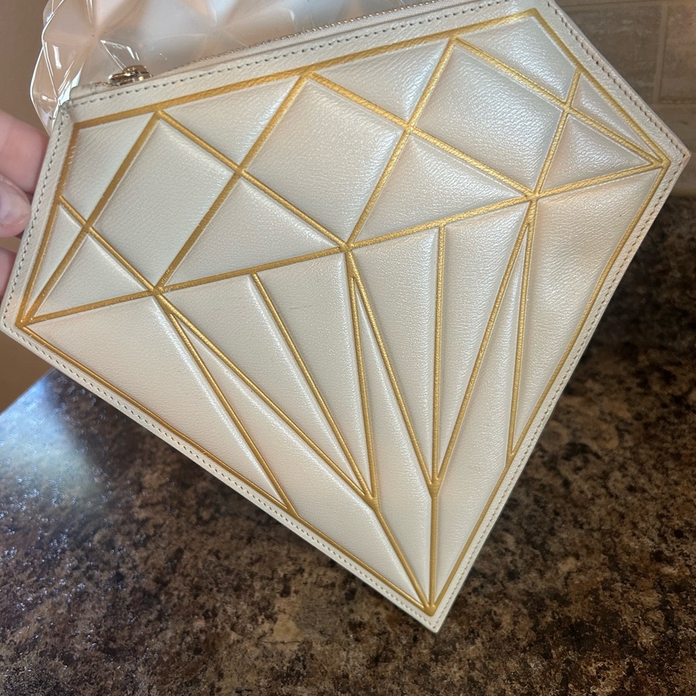 Charlotte Olympia White and Gold Leather Clutch